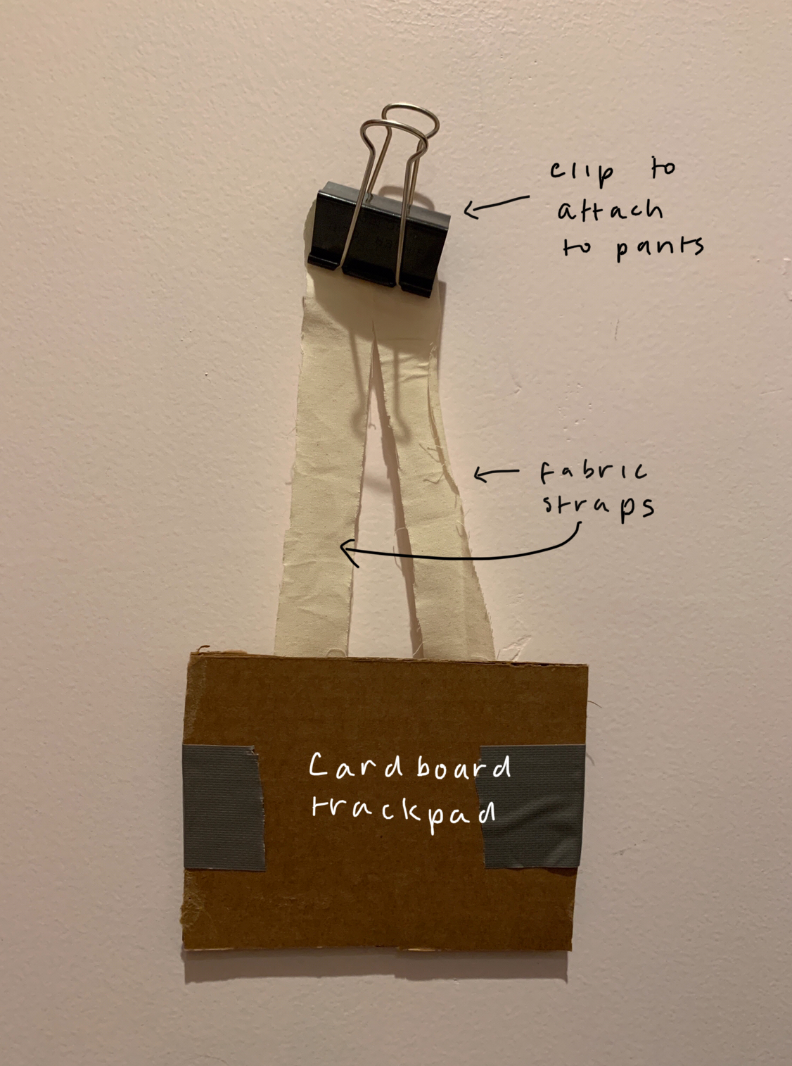 lo fidelity prototype - cardboard square with fabric straps for belt attachment